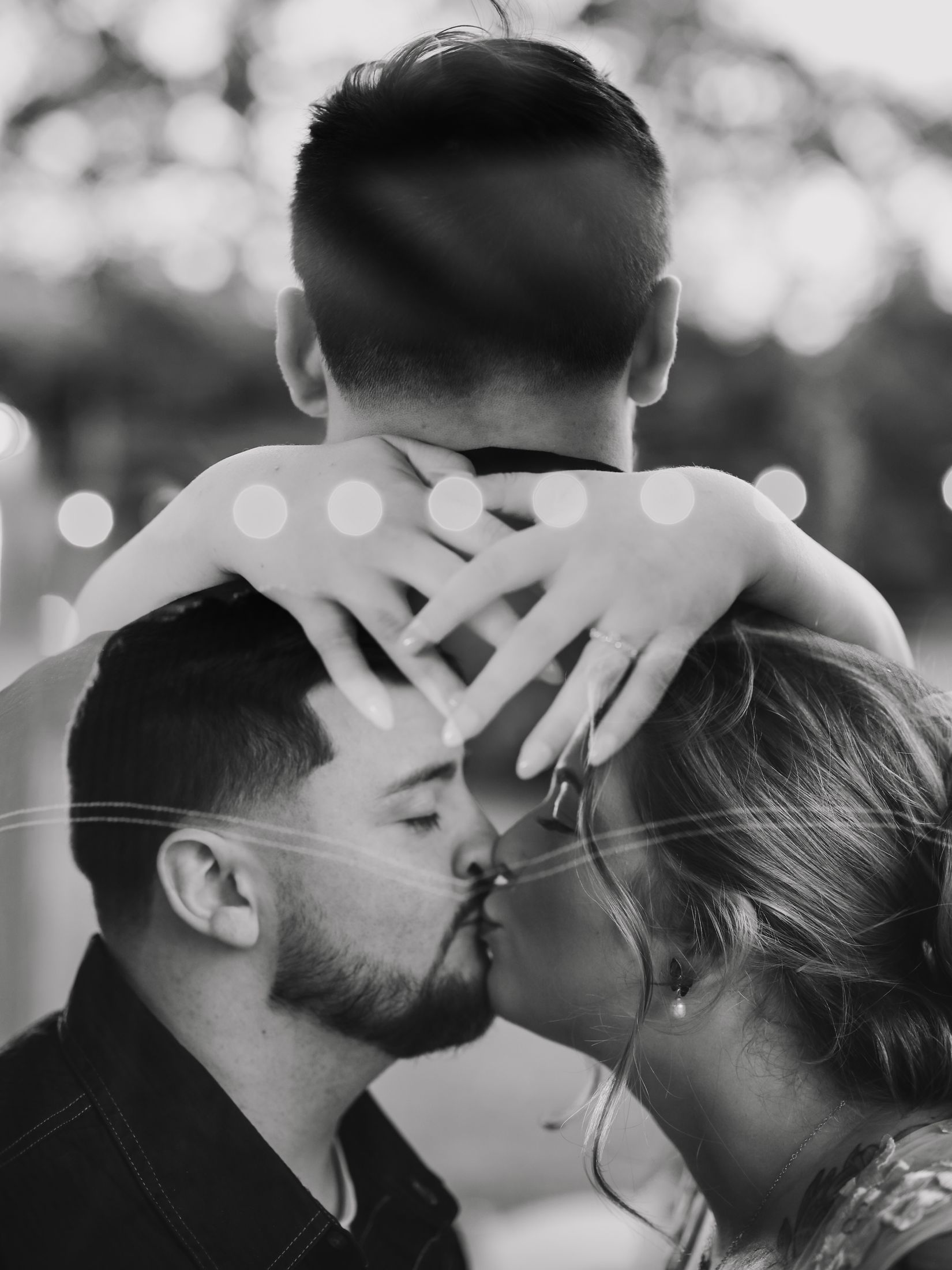 Rebecca wrapping her arms around Knox as they touch foreheads