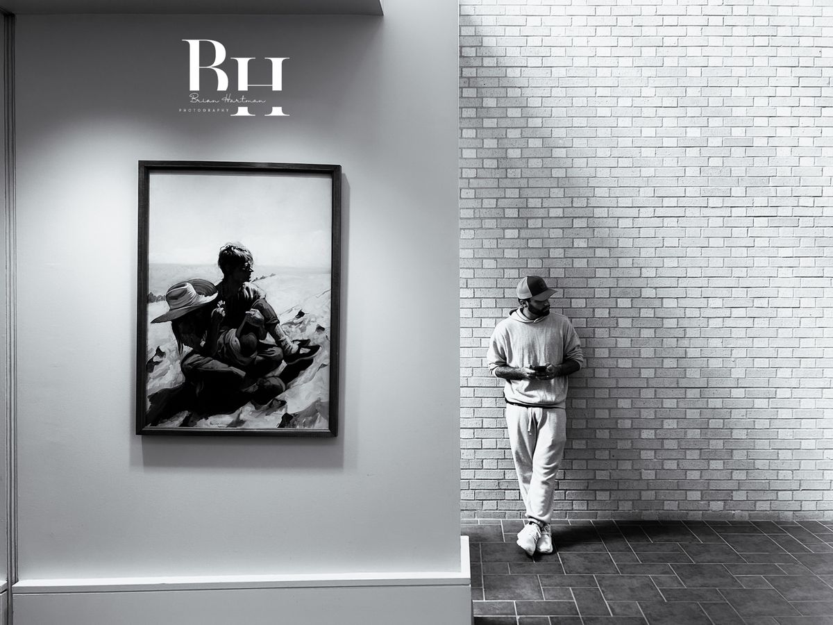 A framed BH Photography print on a gallery wall